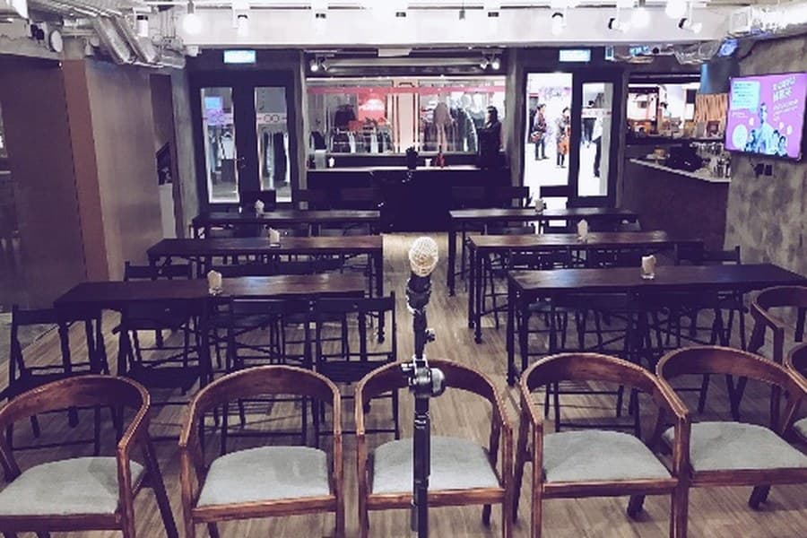 Set up for an event — seating arranged for talks and performances